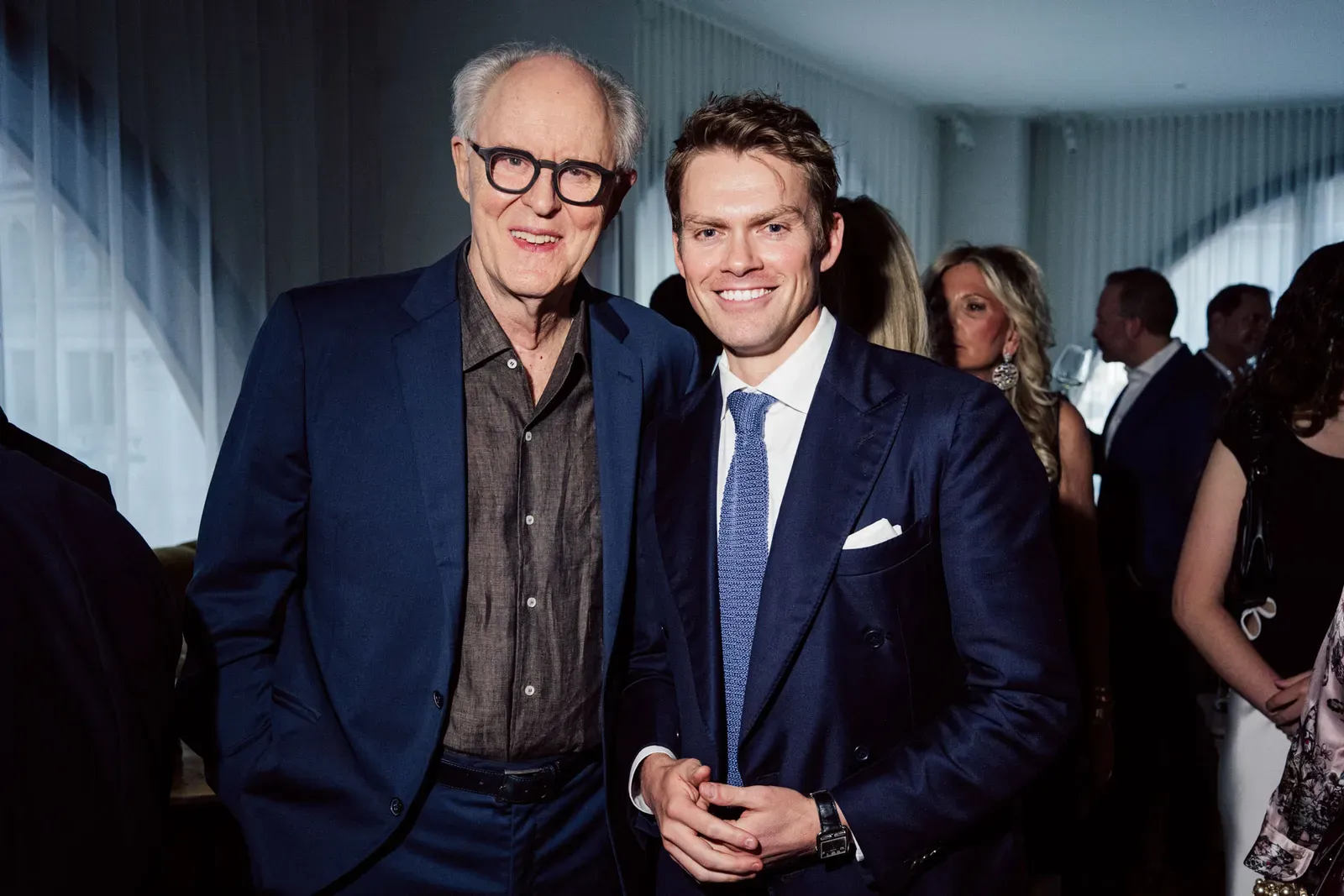 A photo of Actor John Lithgow and Vanity Fair's Mark Guiducci at a pre-Tony awards party held inside private members' club Moss New York.